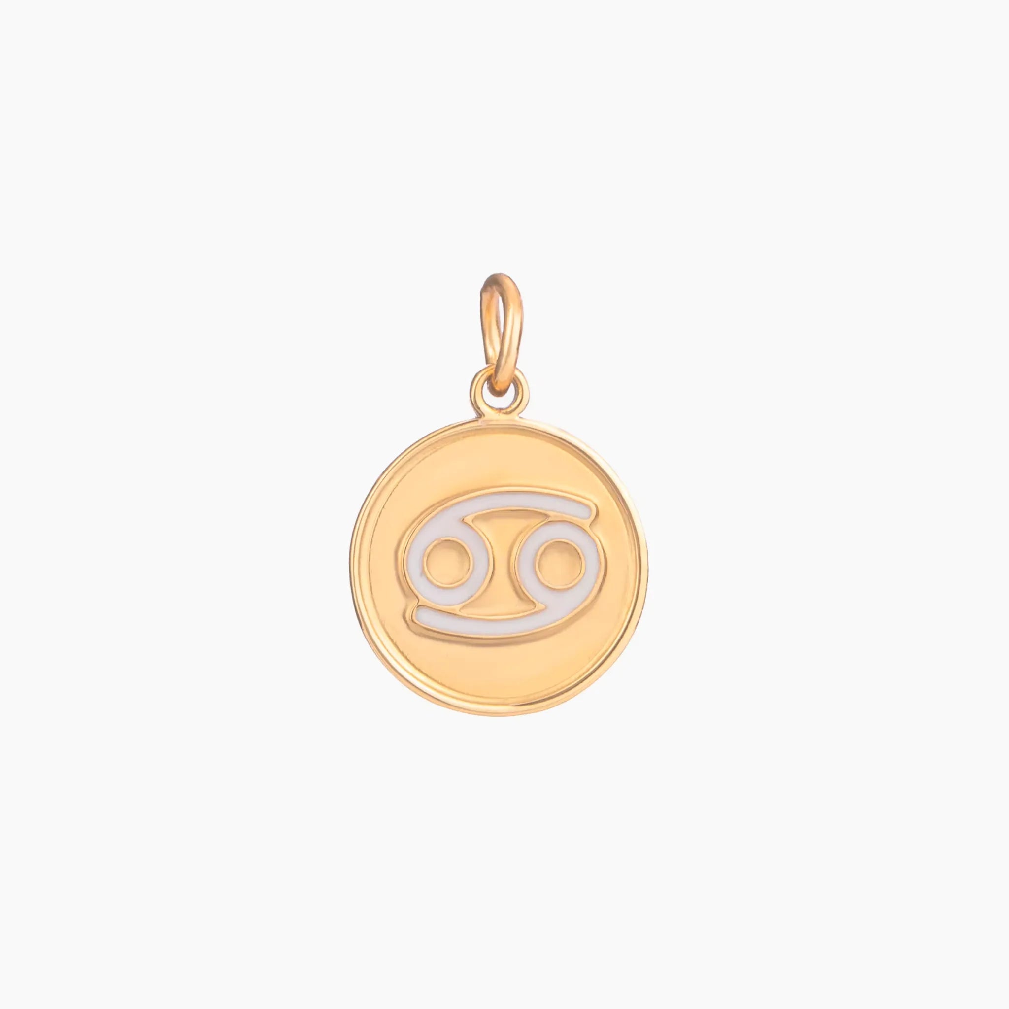 Golden pendant with cancer zodiac symbol on a white background
