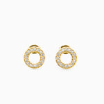 gold stud earrings in open circle shape with embedded clear crystals