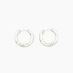 pair of polished silver hoop earrings with a minimal 4 mm design