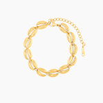 gold bracelet with cowrie shell design, waterproof beach-inspired jewelry