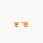 minimal golden stud earrings with polished ball design