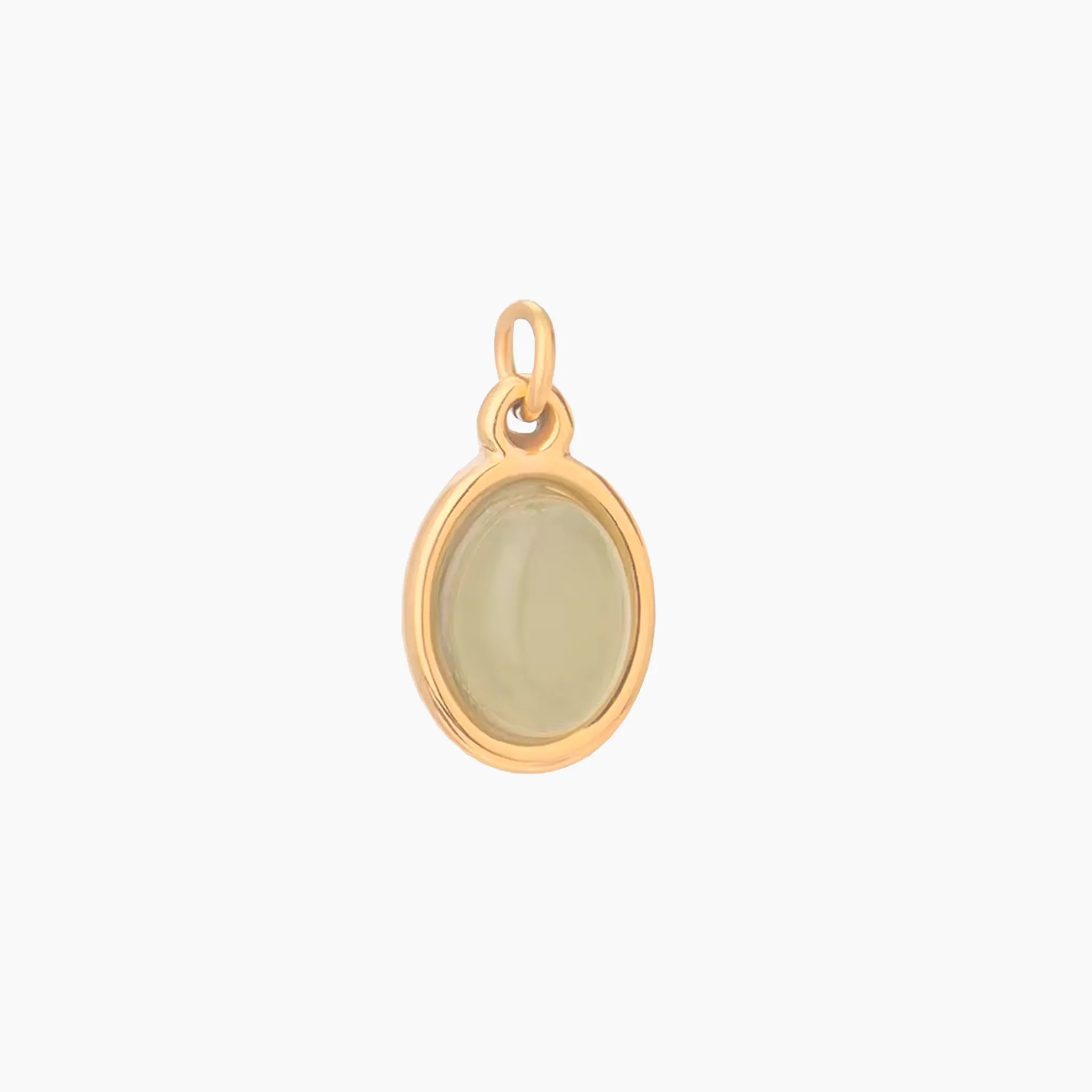 Golden pendant with a green stone on a white background
