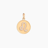 Golden pendant with leo zodiac symbol on a white background