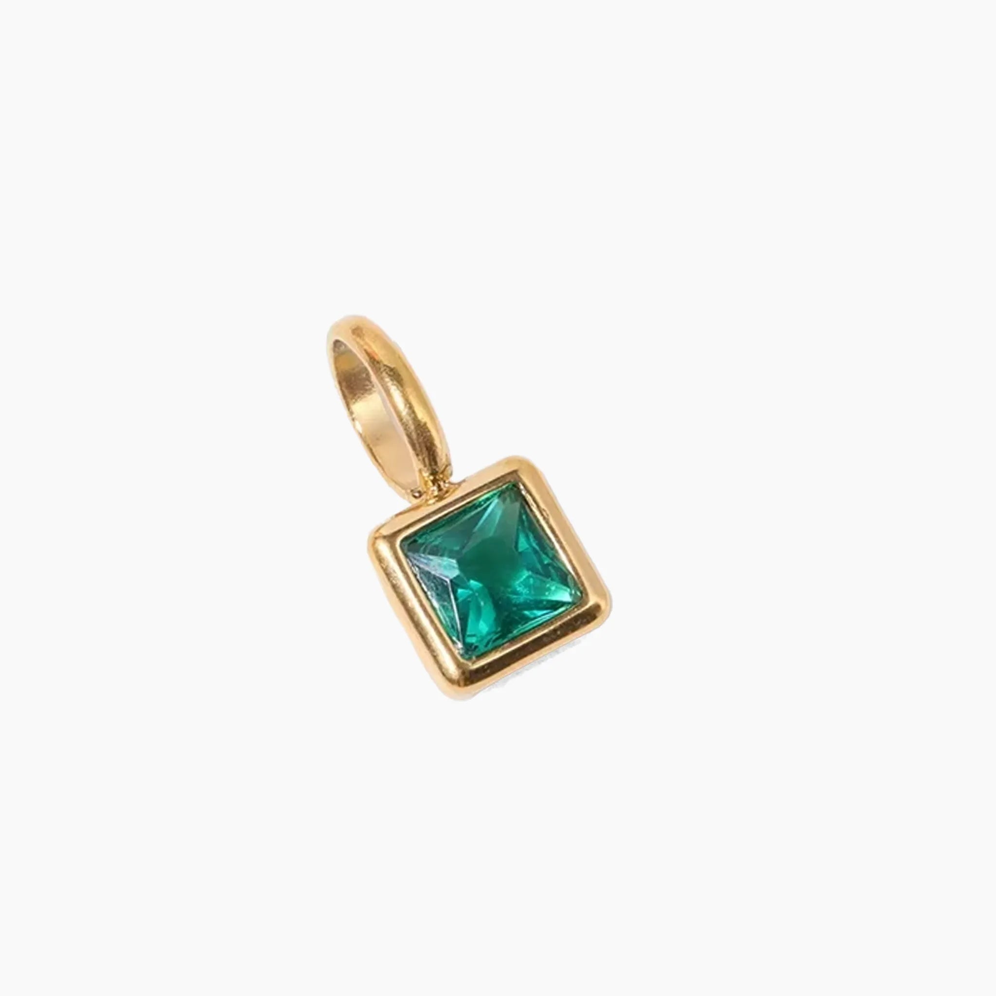 May birthstone charm, golden pendant with a green gemstone on a white background