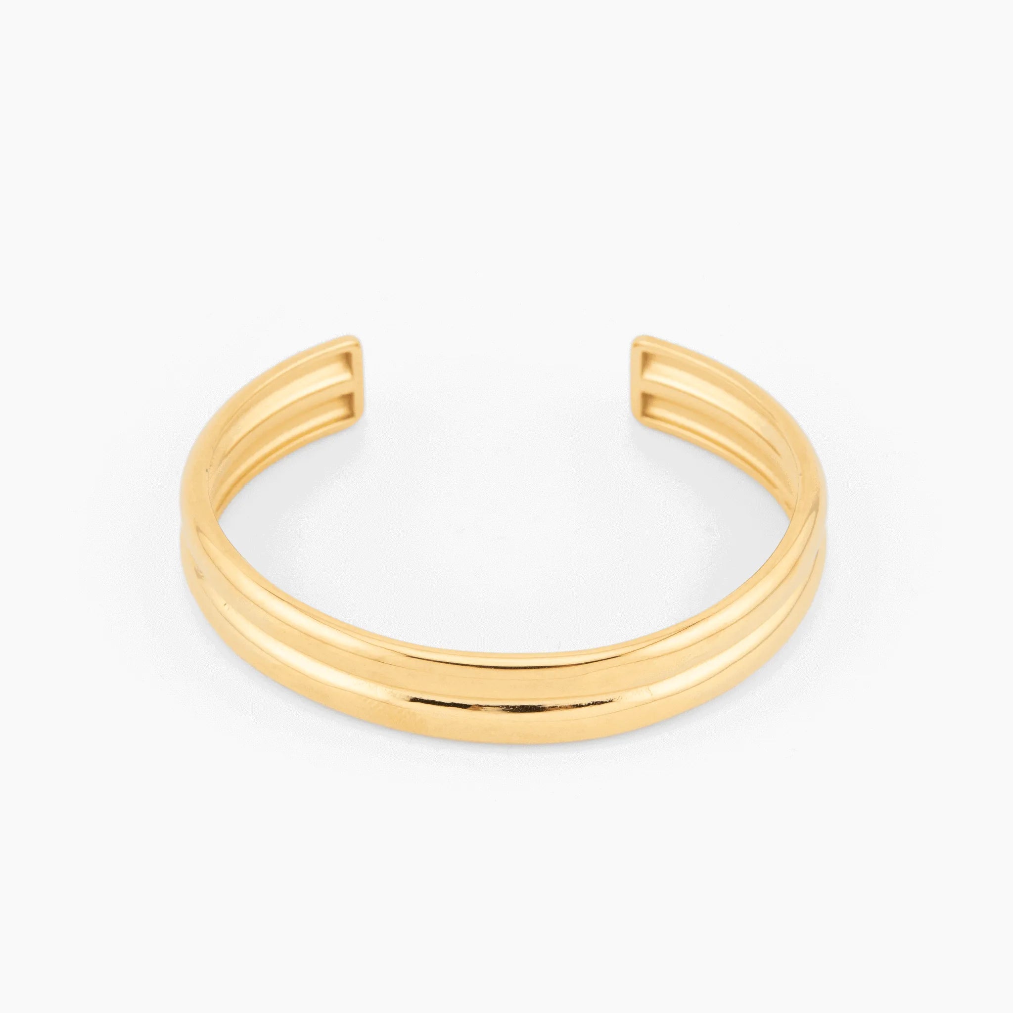 open gold cuff bracelet with minimalist design