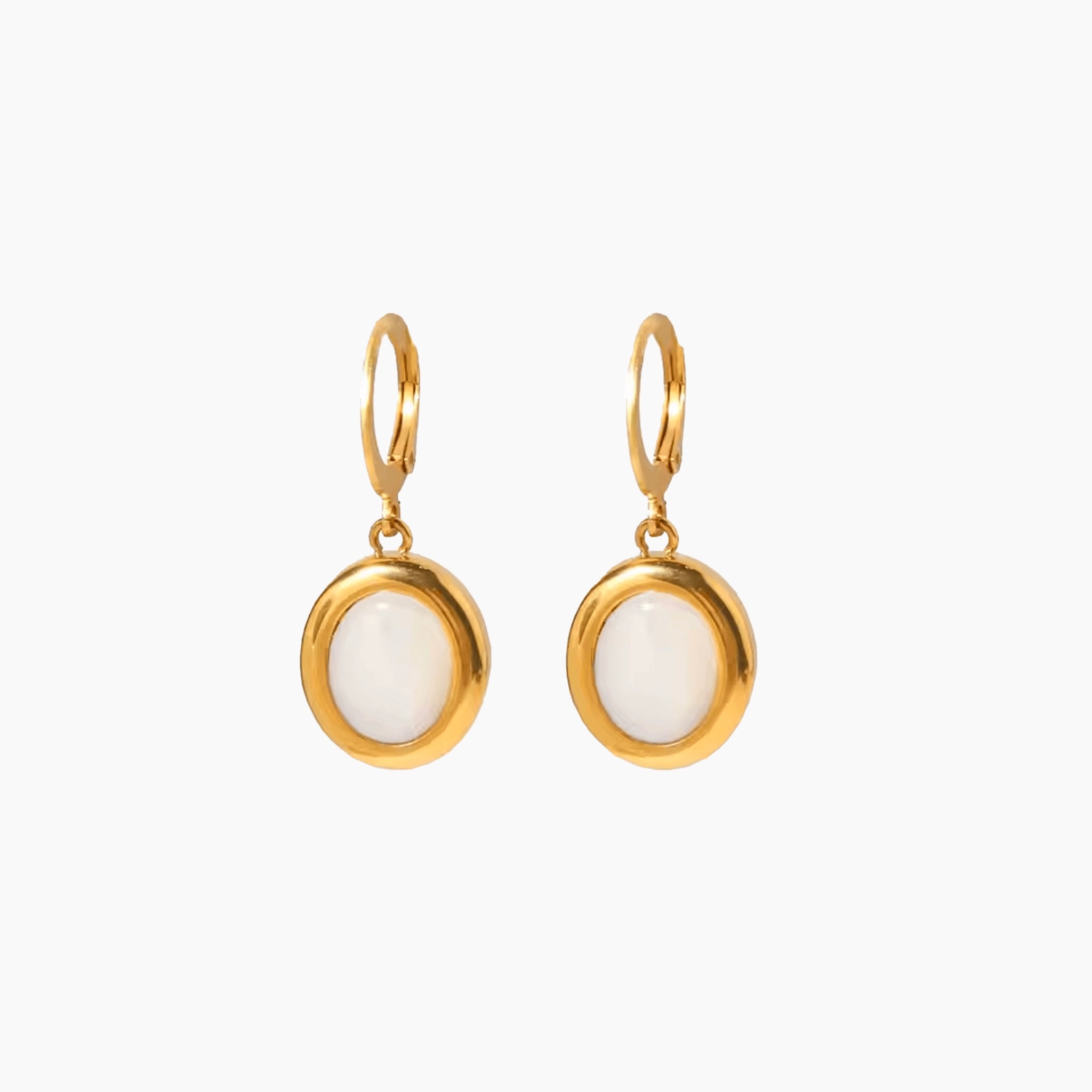gold drop earrings with oval natural white stone