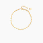 gold bracelet with polished oval beads
