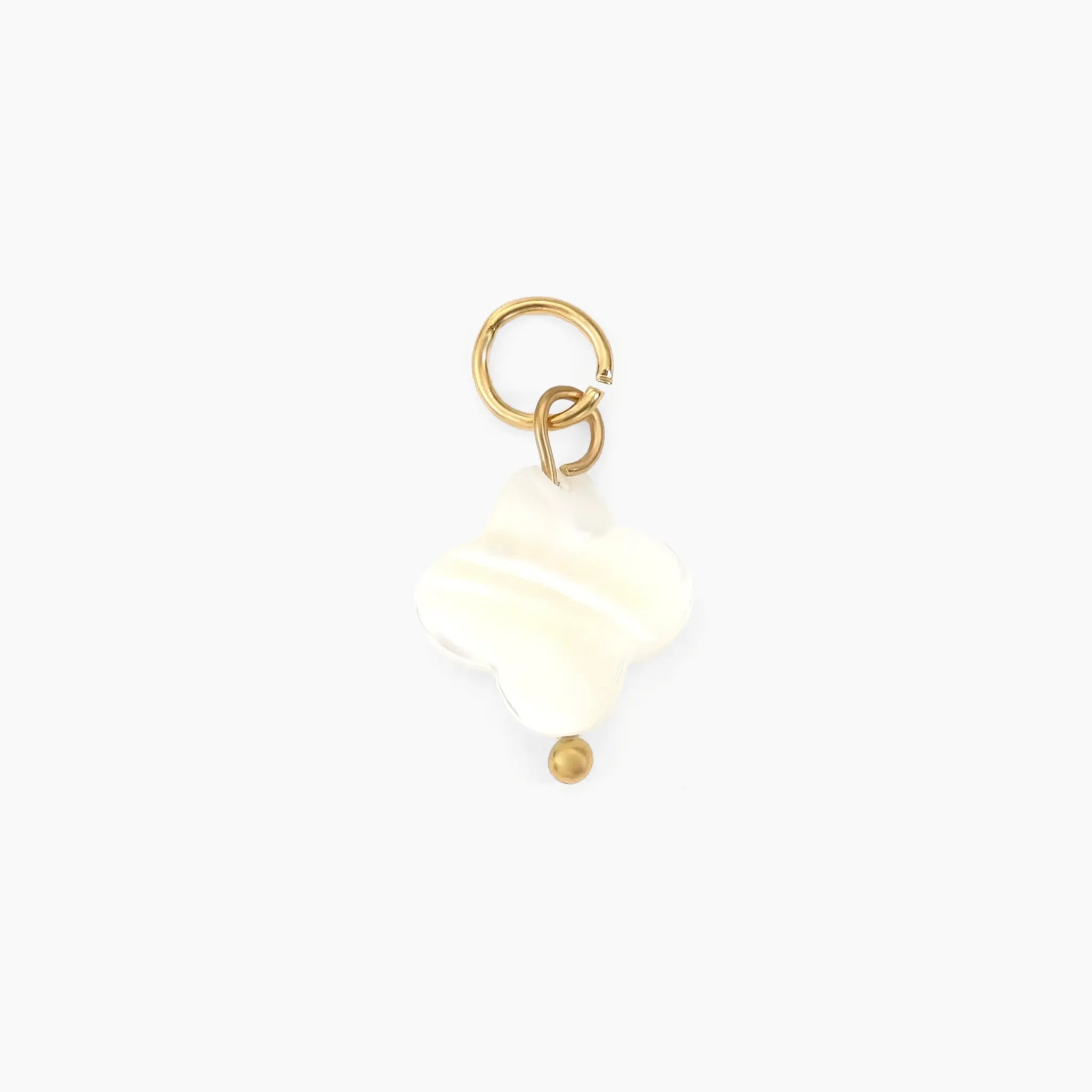 Pearl clover charm on a white background