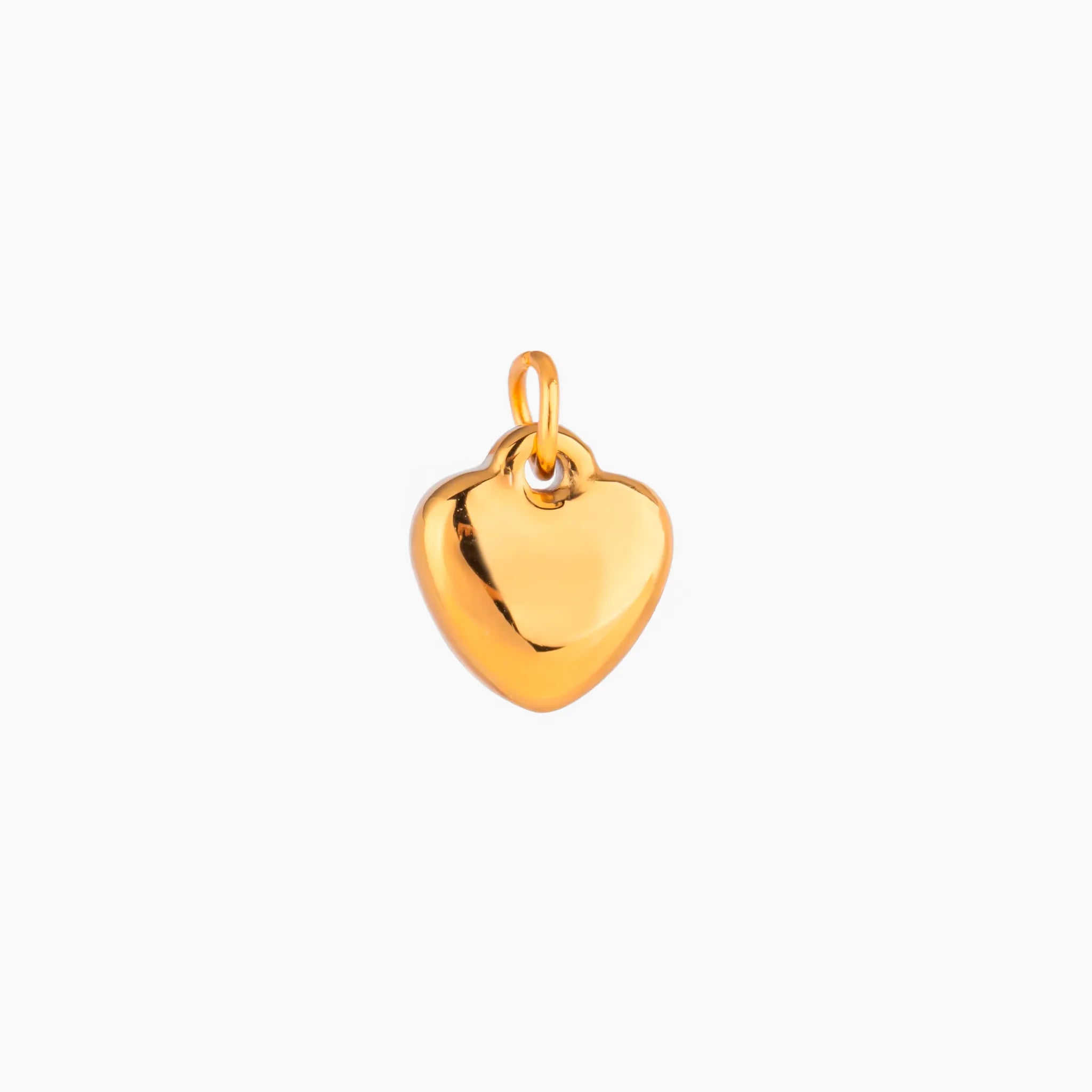 Gold heart-shaped pendant on a white background