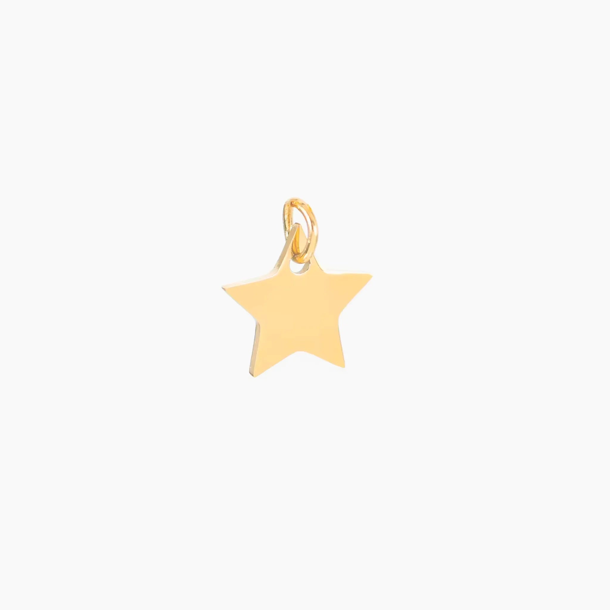 Golde small star-shaped pendant on a white background
