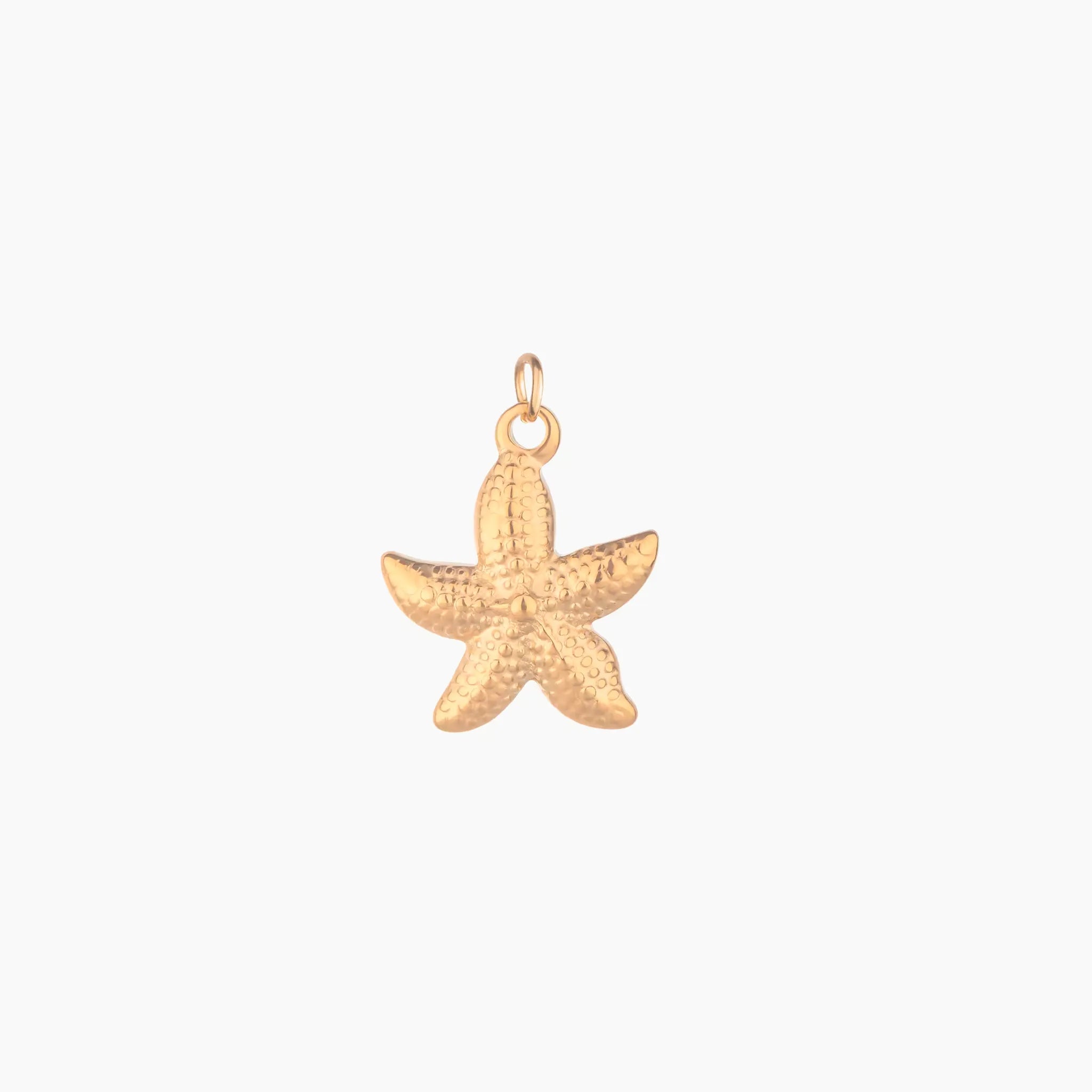 Golden small starfish pendant on a white background