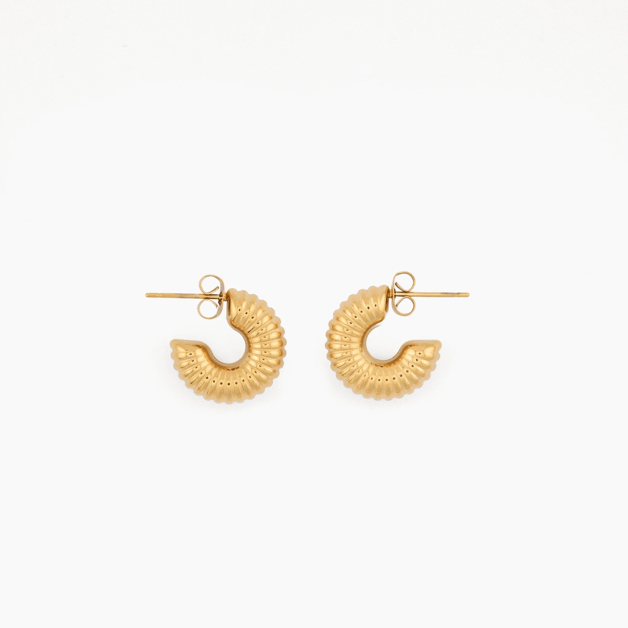 gold spiral hoop earrings with textured finish